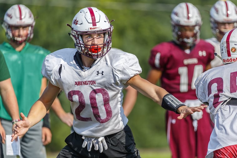 Abington senior defensive back Keith Hudoka (20) runs through a drill during a practice on Sept. 19.