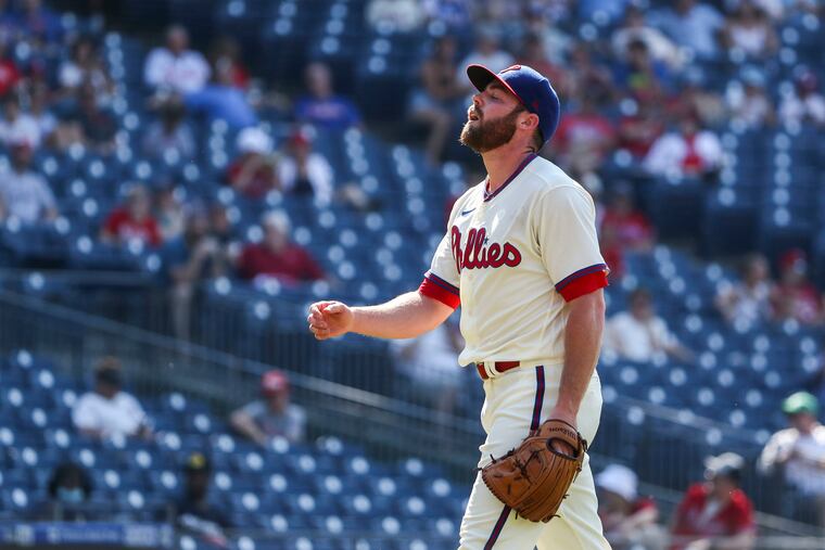 Phillies reliever Sam Coonrod walks off the field after top of the seventh on June 6 against the Nationals.