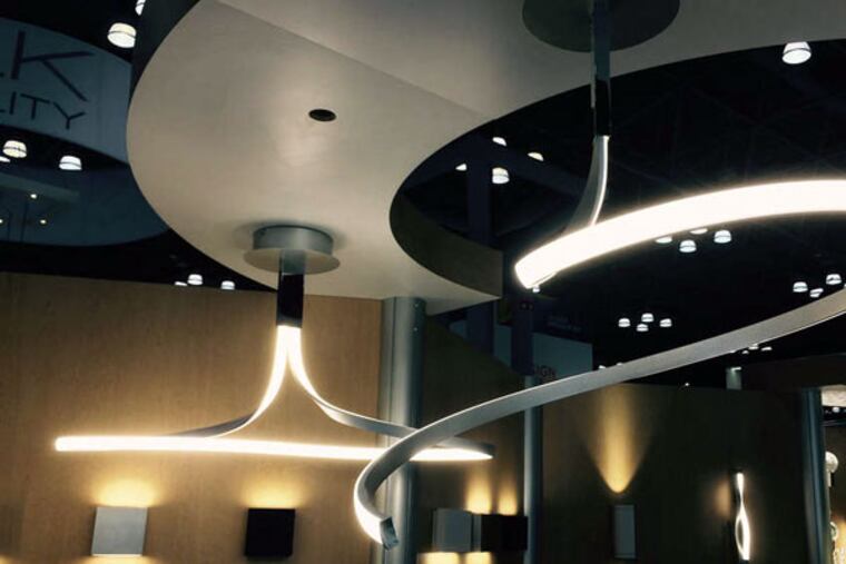 LED light fixtures beyond the mere functional: They float and glow with sculptural charm. (JONATHAN TAKIFF / Staff)