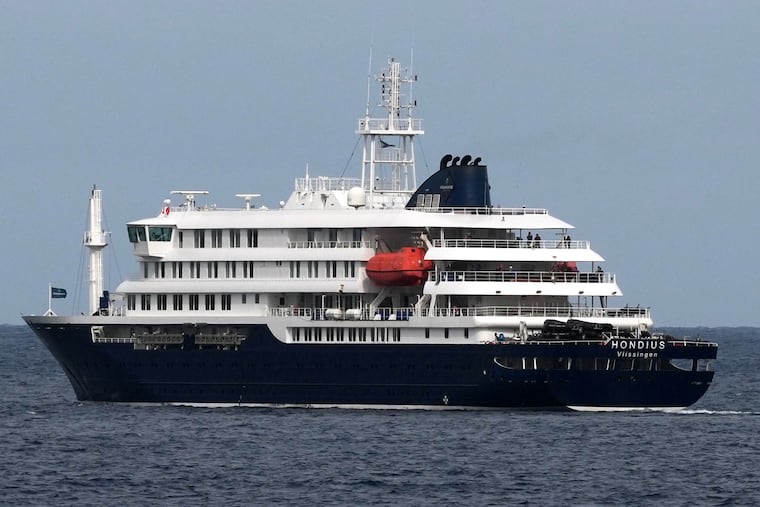 The MV Hondius cruise ship departs the port in Praia, Cape Verde, Wednesday, May 6, 2026.