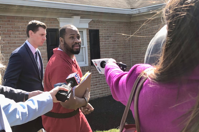 Blair Watts speaks to the media as he is escorted into district court in Limerick for his preliminary hearing. Watts is accused of killing his friend and business partner, Jennifer Brown.