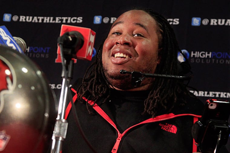 Rutgers retired Eric LeGrand's No. 52. LeGrand broke two vertebrae and suffered a serious spinal cord injury on a kickoff return against Army during the 2010 season. (AP Photo/Mel Evans)
