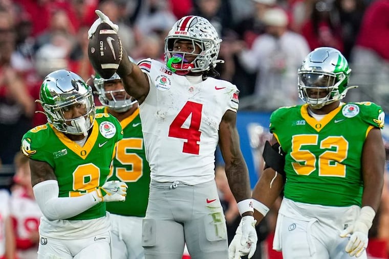 Jeremiah Smith and Ohio State are No. 1 in the preseason Top 25 AP poll, followed by Oregon.