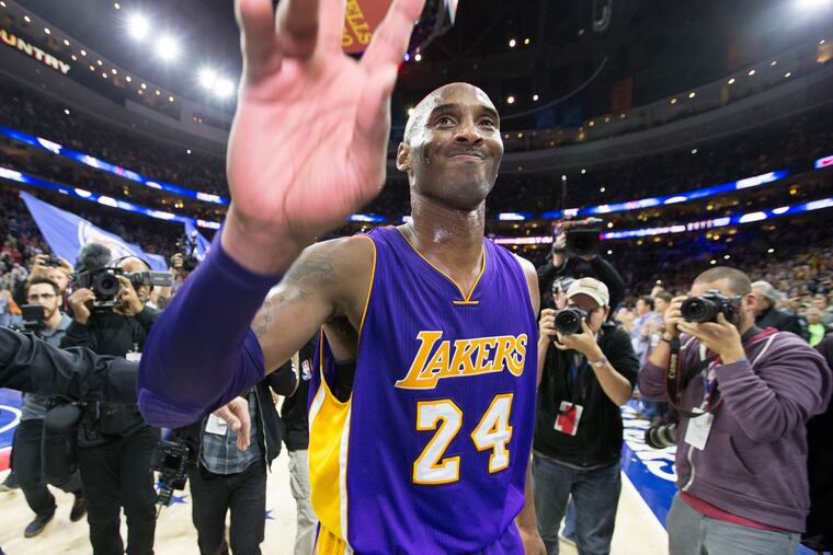 Kobe Bryant of the Lakers walks off the court at the Wells Fargo Center after his last game against the Sixers, on Dec. 1, 2015.