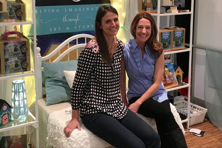 Local mompreneurs Cassie Slane (left) and Ami Van Dine have earned their wings with the Dreamland Fairy toy company.