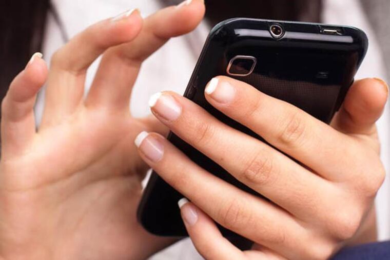 About 90 percent of everyone has a cellphone, smart or dumb, of some kind; that's already a greater proportion than use the Internet. (Stock photo)