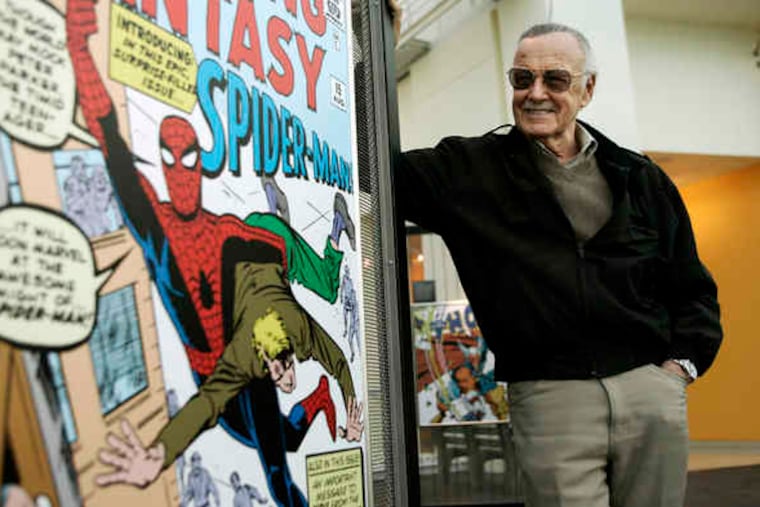 In a 2006 photo, comic book creator Stan Lee, above, stands next to a poster at the Marvel Super Heroes Science Exhibition at the California Science Center in Los Angeles. Below, the Incredible Hulk at the 2008 Comic-Con in San Diego.