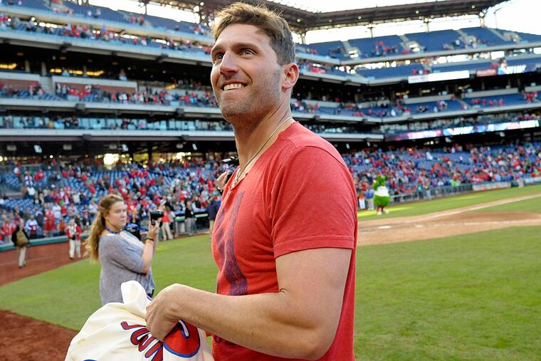 Philadelphia Phillies right fielder Jeff Francoeur (3) prepares to throw his jersey into the crowd after defeating the Miami Marlins in the final game of the season at Citizens Bank Park. The Phillies defeated the Marlins, 7-2.