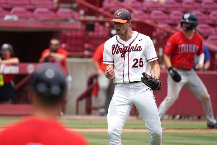 Virginia pitcher Griff McGarry reacts after an inning-ending strikeout during an NCAA college baseball tournament super regional game against Dallas Baptist, Sunday, June 13, 2021, in Columbia, S.C. (AP Photo/Sean Rayford)