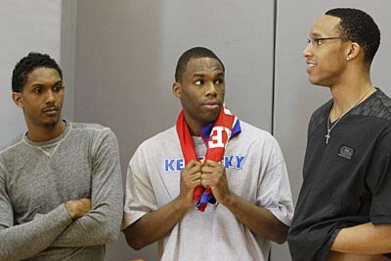 Sixers guards Lou Williams, Jodie Meeks and Evan Turner wait for the press conferences on Sunday. (Akira Suwa/Staff Photographer)