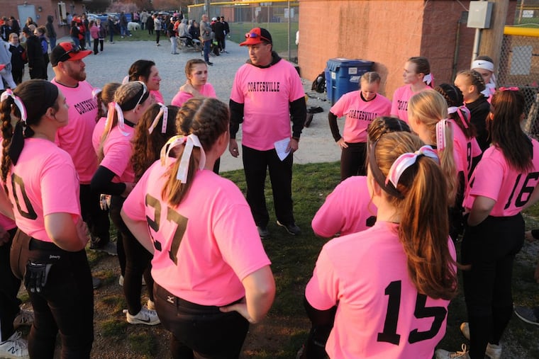 Coatesville head coach Bill Mendenhall gives his girls a pep talk before their game with Downingtown West on April 18th, 2018.