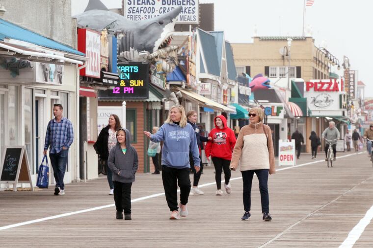 Strollers on the boardwalk in Ocean City on May 12.
