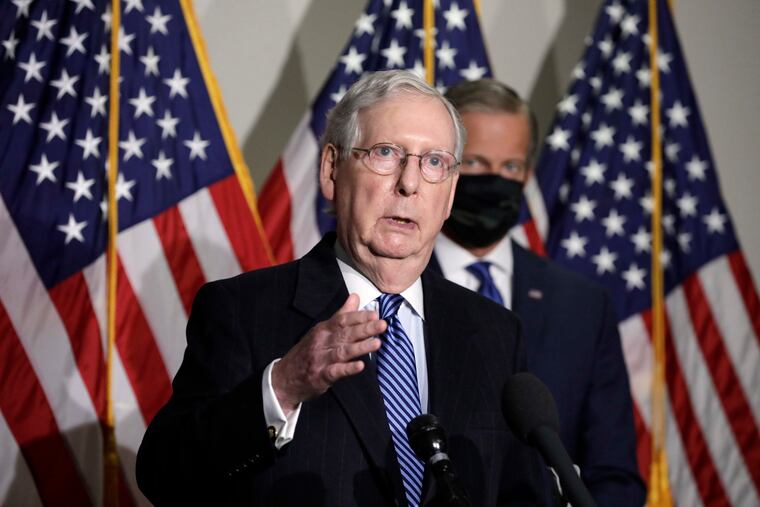 Senate Majority Leader Mitch McConnell (R-KY) talks to the media after at the Republican policy luncheon on Capitol Hill in Washington on November 10, 2020. A bipartisan group of lawmakers, is putting pressure on congressional leaders to accept a split-the-difference solution to the months-long impasse on COVID-19 relief in a last-gasp effort to ship overdue help to a hurting nation before Congress adjourns for the holidays.