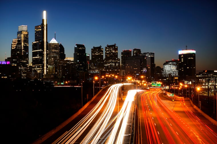 In this image made with a long exposure, motor vehicles move along Interstate 76 ahead of the Thanksgiving Day holiday in Philadelphia in November.