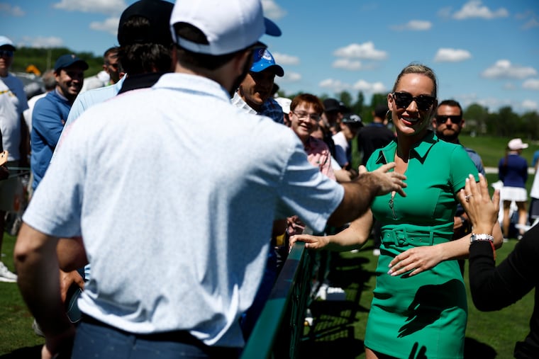 Content creator Paige Spiranac interacts with fans during the Creator Classic event before the Truist Championship at the Philadelphia Cricket Club on Wednesday.