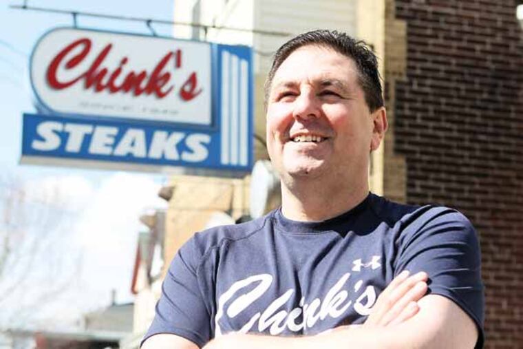Owner Joe Groh stands in Chink's Steaks. In what the owner admits is a long-overdue move toward racial sensitivity, Chink's Steaks, a fixture on Torresdale Avenue since 1949 changes its name today to Joe's Steaks and Soda Shop. ( CHARLES FOX / Staff Photographer )