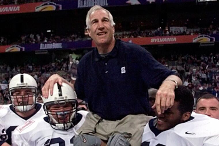 Jerry Sandusky is carried by players after the 1999 Alamo Bowl in San Antonio. At the time, Sandusky was Penn State's defensive coordinator. Gov. Corbett wants to know when the board of the charity Sandusky started knew of allegations. (Eric Gay / Associated Press, file)