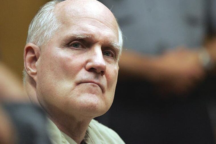 In this Augist 2006 file photo, Robert O. Marshall listens to the proceedings at his sentencing hearing in Toms River, N.J. Marshall, a convicted killer whose case spawned a popular book and TV miniseries, was sentenced Friday to life in prison, but is eligible for parole in eight years. Marshall, once considered first-in-line for execution on the state's death row, was resentenced to life with no parole for 30 years for arranging his wife's murder in a case that inspired the book and TV miniseries "Blind Faith." (AP File Photo/Tim McCarthy, Pool)