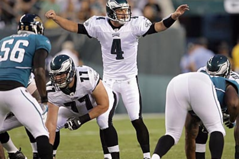 Quarterback Kevin Kolb runs the offense during last night's preseason opener at the Linc. (Yong Kim / Staff Photographer)
