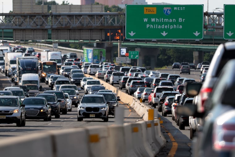 Traffic around the Walt Whitman Bridge in July. A bill that would require cars in the commonwealth to have front license plates deserves support in the General Assembly, writes the Editorial Board.