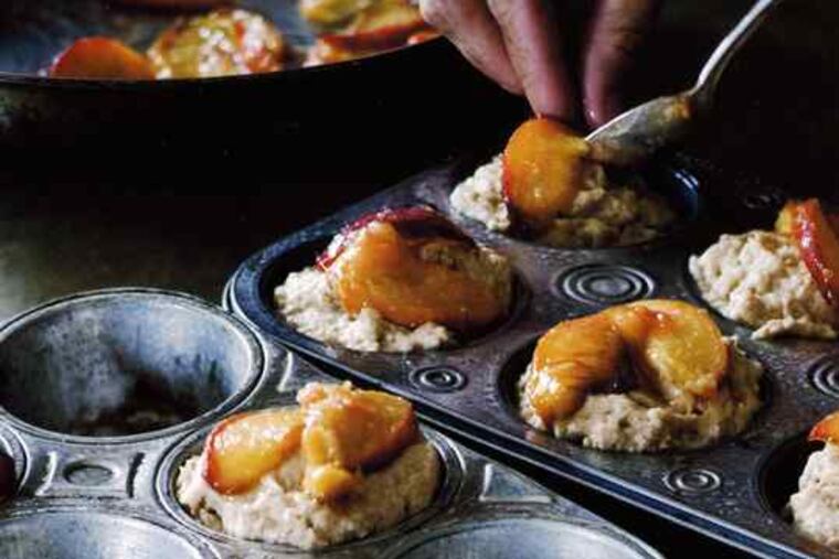Peaches are used as topping on these muffins. Baking with whole grains "is all about balance," says cook Kim Boyce, author of "Good to the Grain." (below)