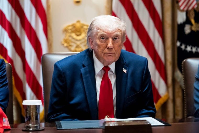 President Donald Trump attends a meeting with his cabinet in the Cabinet Room of the White House in Washington, May, 27, 2026. A federal judge in Miami made a striking turnabout on Friday, reopening Trump’s $10 billion case against the IRS and saying that she wanted to investigate “grievous allegations” that the hasty deal to resolve it was “premised on deception.”
