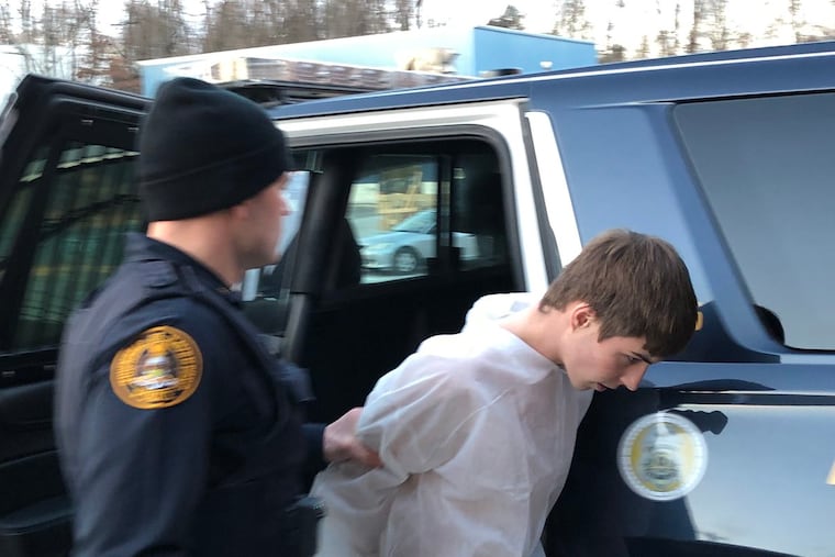 James McCauley, 18, seen here after his arrest in 2019, shot a classmate at Haverford High School in the face during a meeting to sell marijuana. His attorney has said McCauley fired in self-defense, and had been attacked.