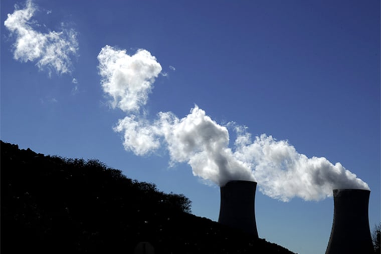 Clouds of condensed water vapor leave the cooling towers of the Limerick nuclear power plant in Pottstown Monday, November 18, 2013. CLEM MURRAY / Staff Photographer
