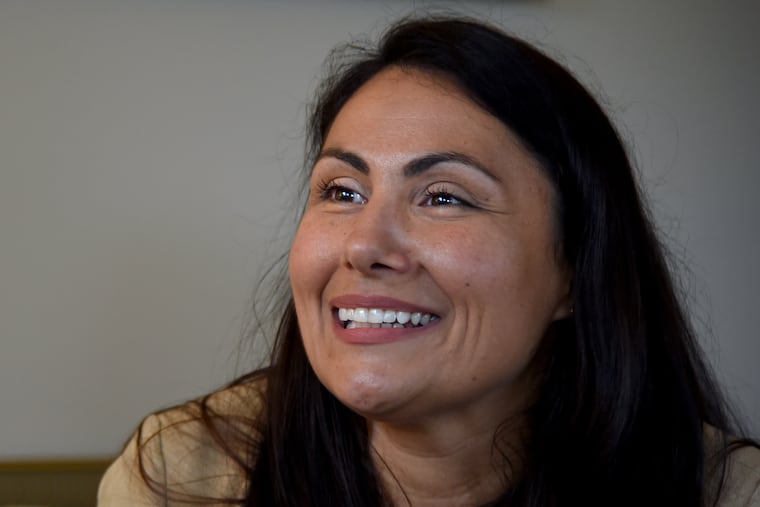 Democrat Judy Moore is facing a lawsuit from a former campaign consultant while challenging longtime GOP City Councilman Brian O'Neill.