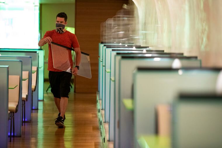 Darrell Shoaff installs clear acrylic dividers at Morimoto. Restaurants and bars, which were particularly hit hard by state shutdown orders, hired 1.5 million people in June.