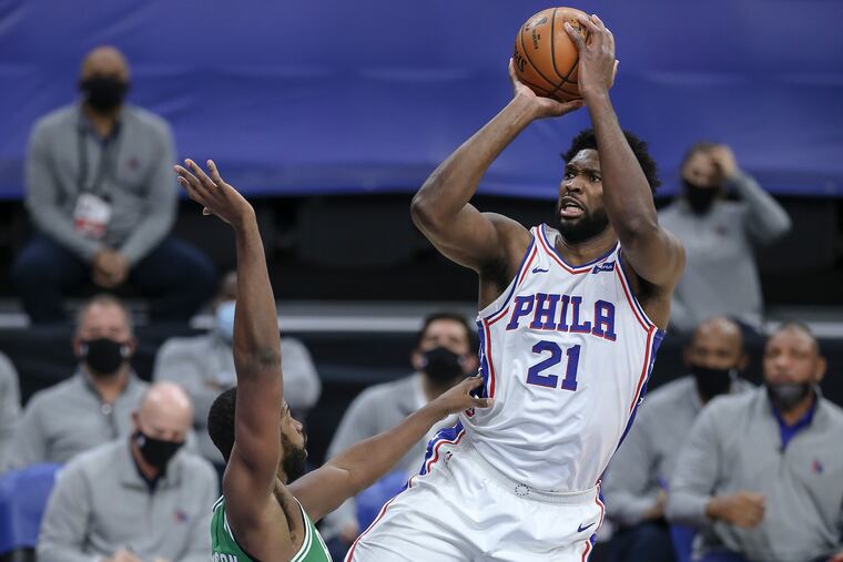 Joel Embiid shoots over the Celtics' Tristan Thompson during the third quarter.