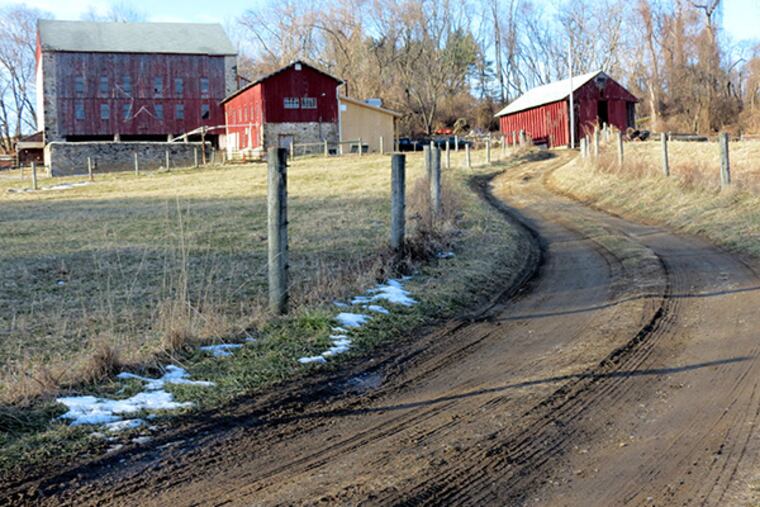 Deer Creek Malthouse (center) with tan addition is located in a 150-year-old bar on a farm in bucolic Chester County.