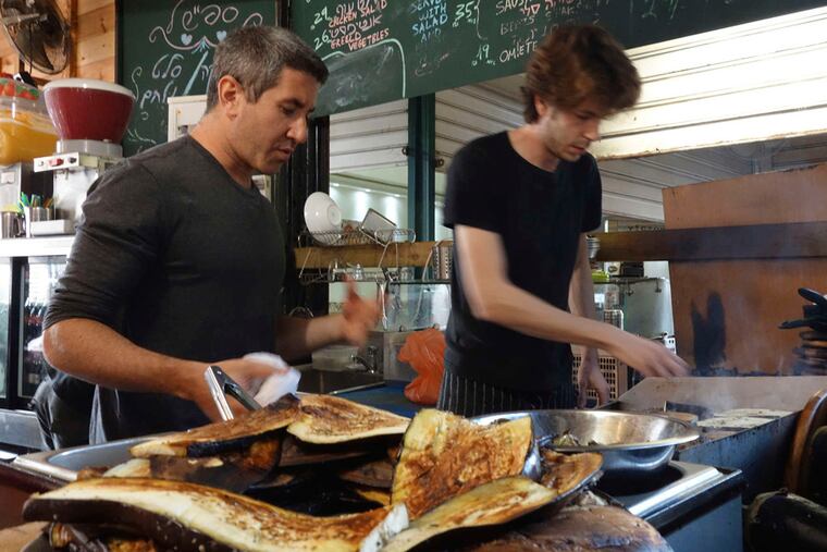 Michael Solomonov, left, of Zahav restaurant in Philadelphia is the chef/guide of "In Search of Israeli Cuisine."