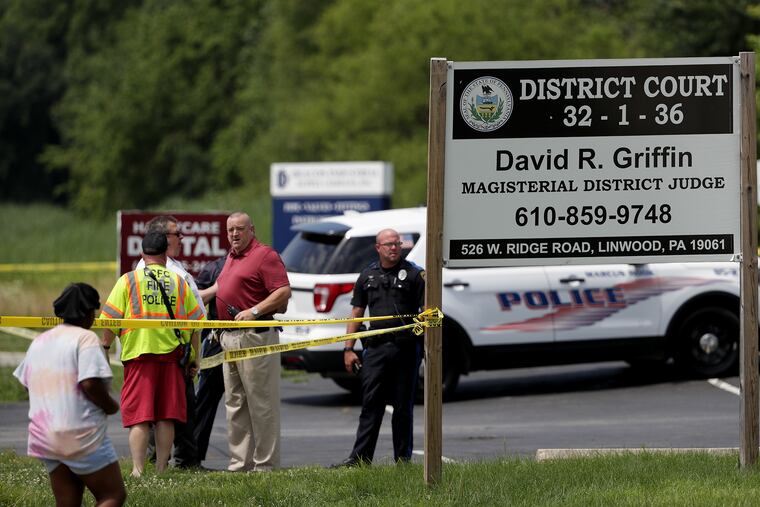 Police at the scene of a deadly shooting outside Linwood District Court in Lower Chichester Township, Delaware County.