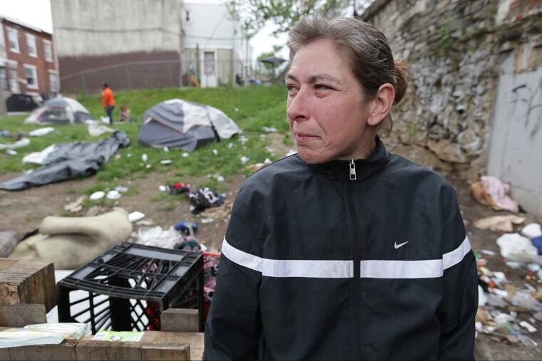 Joanne Smith, 41, who said she has been living under the bridge at Kensington and Lehigh for a year, talks of finding housing in Philadelphia, PA on May 22, 2018. Smith and others living under the bride will need to relocate by the end of this month.