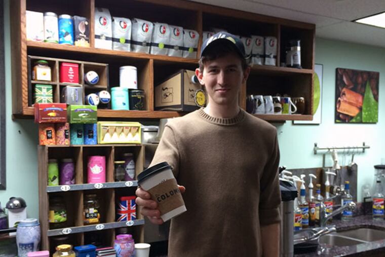 Barista Pearse Pinch behind the counter at Cafe Walnut. (Vinny Vella / Daily News)
