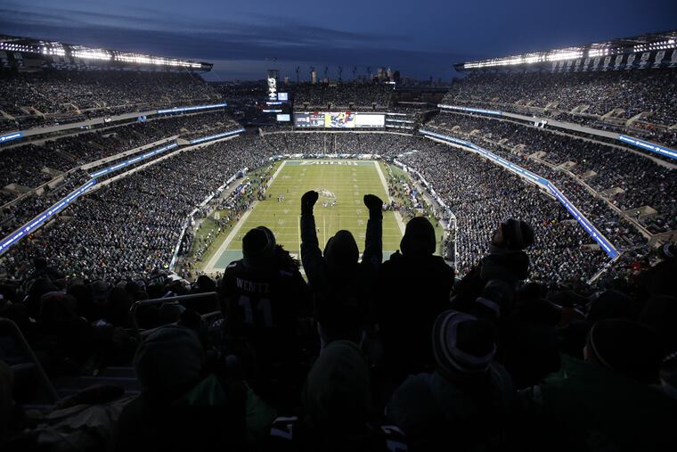Eagles fans cheer during the team's 15-10 playoff win against the Atlanta Falcons at Lincoln Financial Field on January 13, 2018.