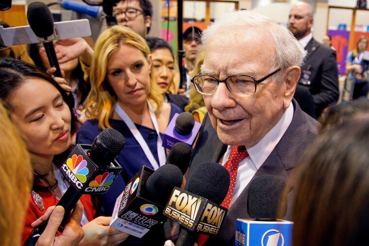 File photo of Warren Buffett, chairman and CEO of Berkshire Hathaway, speaking to reporters before presiding over the annual shareholders meeting in Omaha, Neb., in 2019.