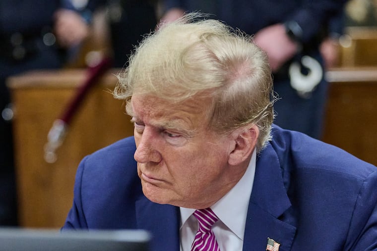 Former President Donald Trump appears at Manhattan criminal court in New York on Friday,