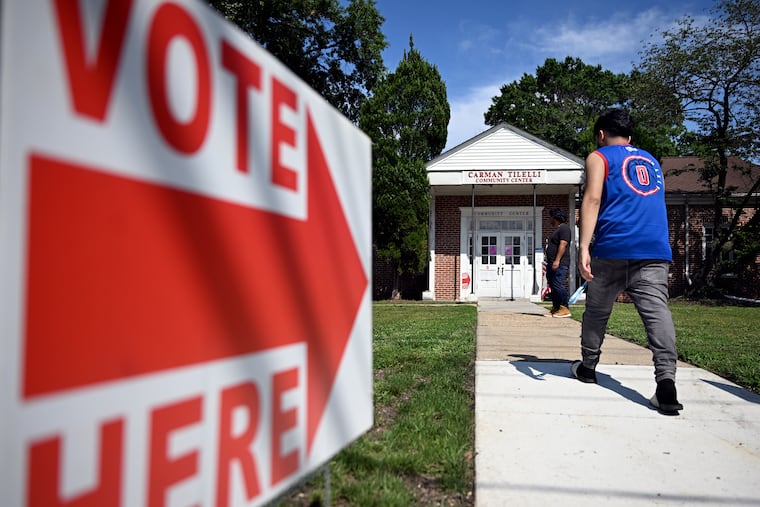 Voters arrive at the election polling place at the Carman Tilelli Community Center in the Cherry Hill Township Municipal Complex in June 2025.