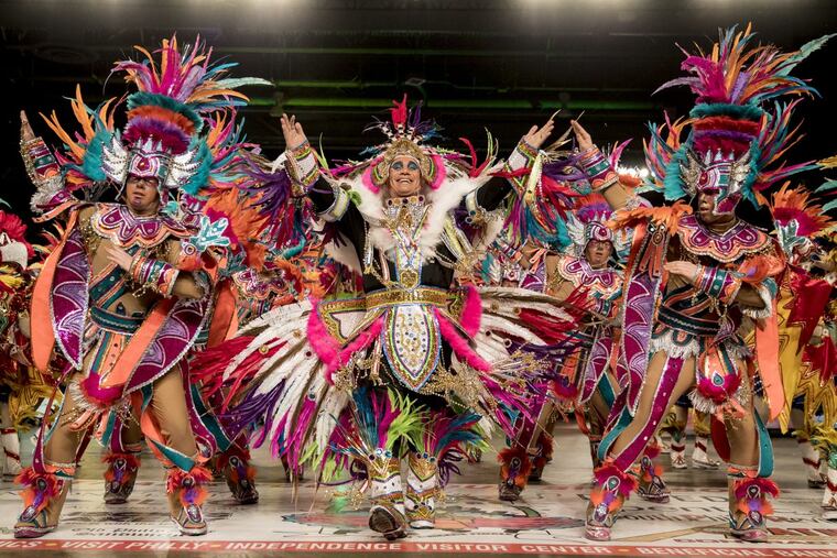Downtowners’ Captain Anthony Stagliano, center, dances the middle of his brigade as they perform "Rio Festival of Animals.”