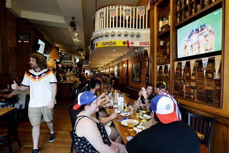 Soccer fans watch Ecuador take on the Ivory Coast during a World Cup soccer watch party at Brauhaus Schmitz on June 14.