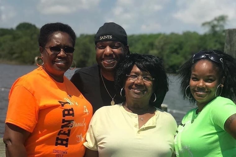 Mary Sharp, 85, died of COVID-19 in April. Her death motivated her daughter, Althea Willis to encourage her friends to vote for Joe Biden. CAPTION IDs UPDATED NOV.1, 2020: From left to right, Althea Willis; her son, Led-G Willis; Mary Sharp; and Althea’s daughter, Aisha Henry.