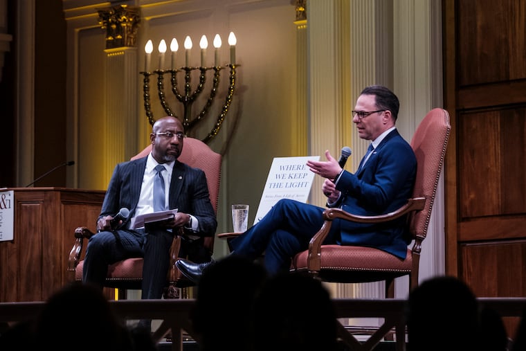 Gov. Josh Shapiro (D., Pa.) and Sen. Raphael Warnock (D., Ga.) speak during a talk for Shapiro's memoir, “Where We Keep the Light,” on Jan. 29, 2026, in Washington.