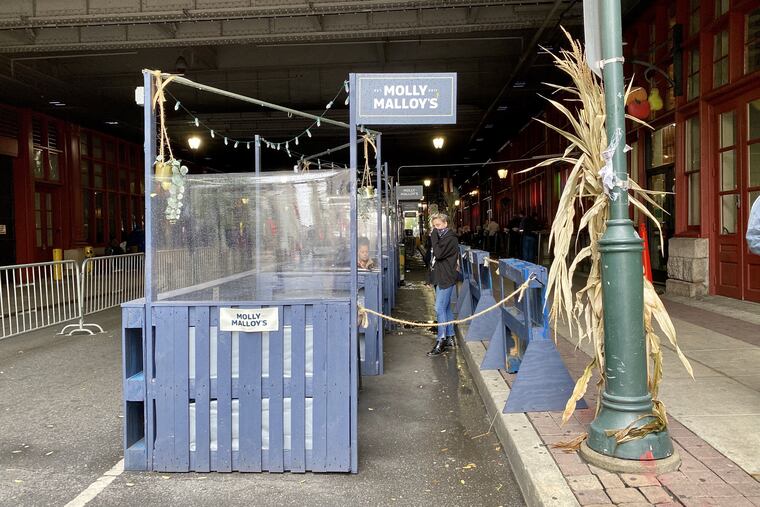 Molly Malloy's has a streetery on Filbert Street, shielded in clear plastic, outside Reading Terminal Market.