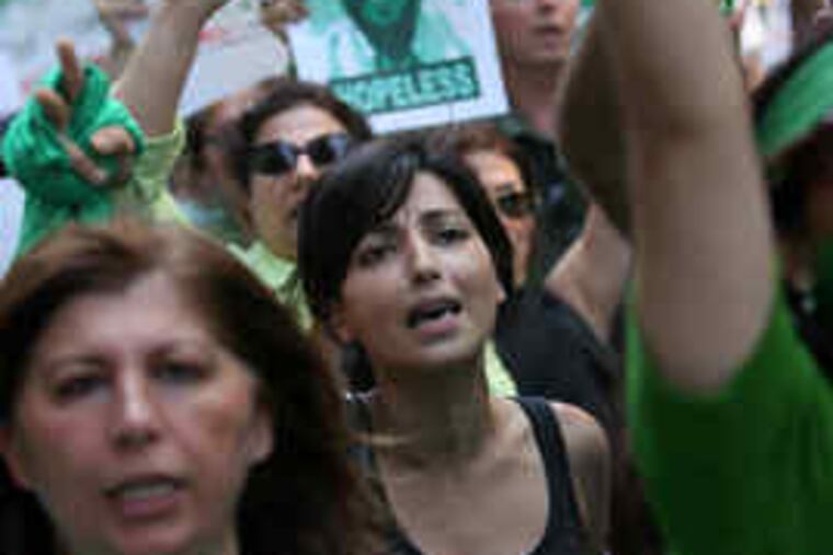Fatima Khanoam of San Francisco chanted at a rally in New York City against the Iran government. At least 80 cities took part.
