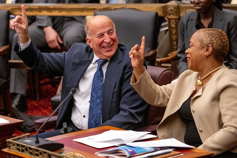 Councilmembers Mark Squilla and Cindy Bass give the One Philly sign with Mayor Cherelle L. Parker as she concludes her address unveiling her long-awaited plan to build or preserve 30,000 units of housing during a special session of City Council on March 24, 2025. Both may be facing competitive Council races in 2027.