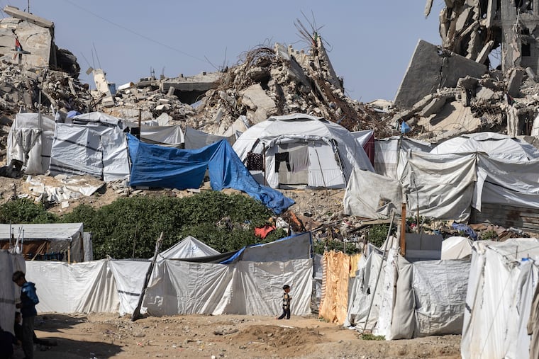 Displaced Palestinians’ tents are among destroyed buildings in the Zeitoun neighborhood of Gaza City on Feb. 12. The U.S. State Department on Wednesday, Aug. 26, 2026, designated three groups based in Europe, including two that advocate Palestinian rights, as transnational terrorist organizations.