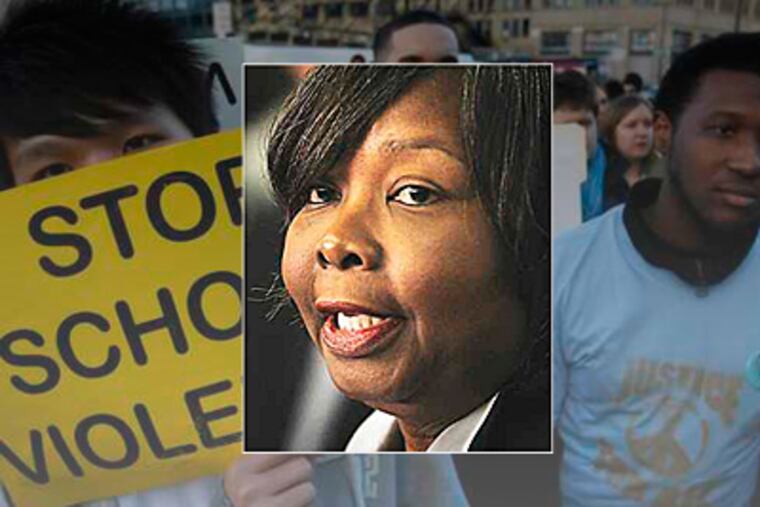 LaGreta Brown, who recently stepped down as principal at South Philadelphia High School, remains a school district employee. In the background, students rallied in response to violence at the school. (File photos)