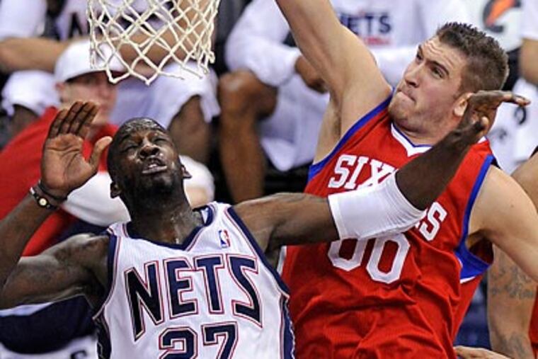 "We did just enough to win the game," 76ers coach Doug Collins said. (Bill Kostroun/AP)